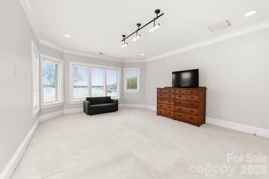 Positioned along a pristine shoreline on Lake Norman, this gated - photo 26
