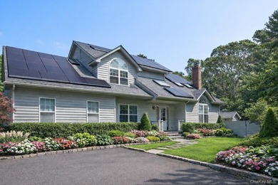 Tucked just off the main corridor in East Hampton, this private - photo 1