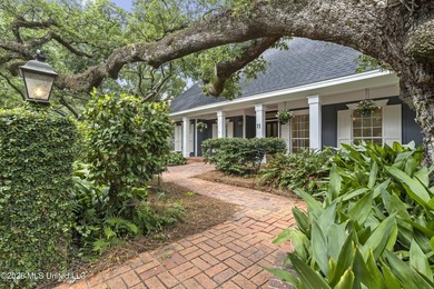 A canopy of magnificent century-old live oaks welcomes you to - photo 5