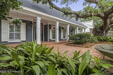A canopy of magnificent century-old live oaks welcomes you to - photo 9