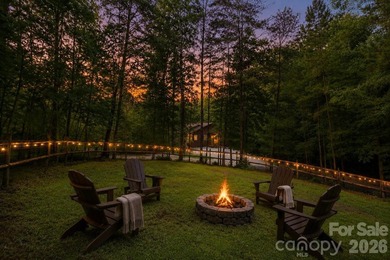 Escape to the mountains in this custom log cabin located in the - photo 25