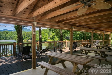 Escape to the mountains in this custom log cabin located in the - photo 35