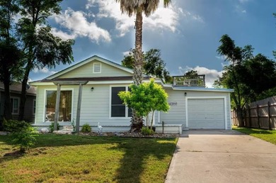 Welcome to this charming beach-style retreat - offered fully - photo 1