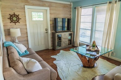 Welcome to this charming beach-style retreat - offered fully - photo 2