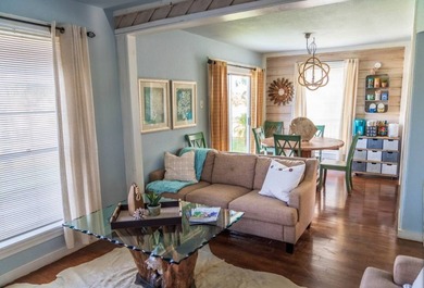 Welcome to this charming beach-style retreat - offered fully - photo 3
