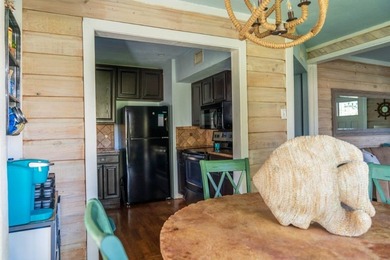 Welcome to this charming beach-style retreat - offered fully - photo 5