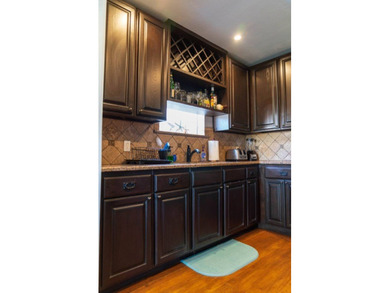 Welcome to this charming beach-style retreat - offered fully - photo 6