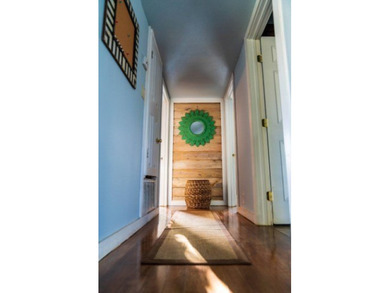 Welcome to this charming beach-style retreat - offered fully - photo 8
