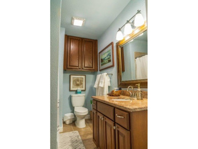 Welcome to this charming beach-style retreat - offered fully - photo 9