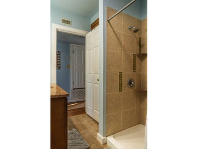 Welcome to this charming beach-style retreat - offered fully - photo 10