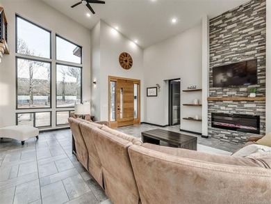 PANORAMIC LAKE VIEWS + TRUE LAKE LIFE LIVING! Discover elevated - photo 12