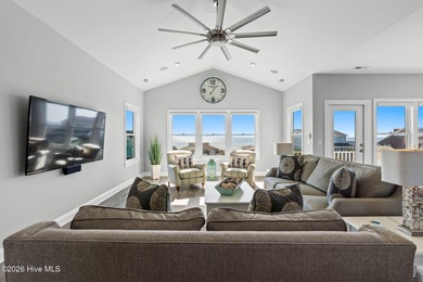 Beach access directly across the street sets the tone for this