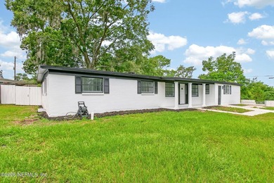 Welcome home!!! Renovated 5-bedroom, 3 bath home situated in an - photo 3