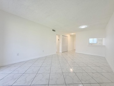 Beautifully renovated 2-bedroom, 1-bath second-floor condo - photo 1