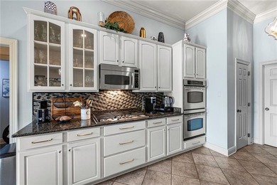 Luxury living in the gated golf course community of Masters - photo 13
