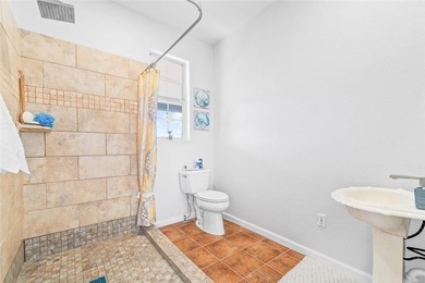 Coastal charm with flexible living space in the desirable - photo 17