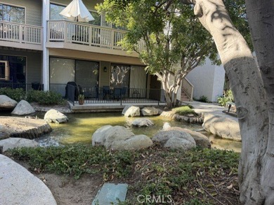 Tranquil Living at Its Best - Bottom-Floor Retreat in Gated - photo 1