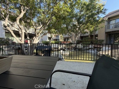 Tranquil Living at Its Best - Bottom-Floor Retreat in Gated - photo 2