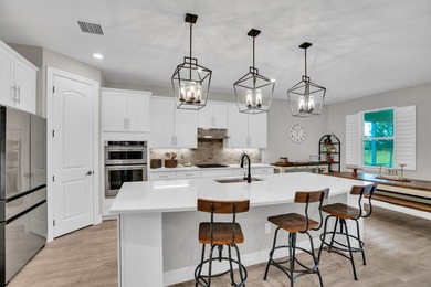 WOW!!! Like new 2022 smart energy-efficient home in Heron - photo 11