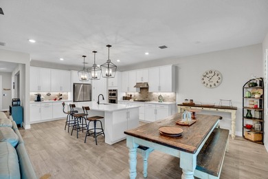 WOW!!! Like new 2022 smart energy-efficient home in Heron - photo 15
