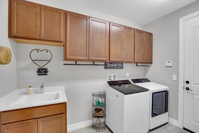 WOW!!! Like new 2022 smart energy-efficient home in Heron - photo 37