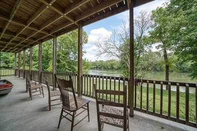 *Down by the lazy river* happily describes this riverside home - photo 37