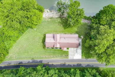 *Down by the lazy river* happily describes this riverside home - photo 38