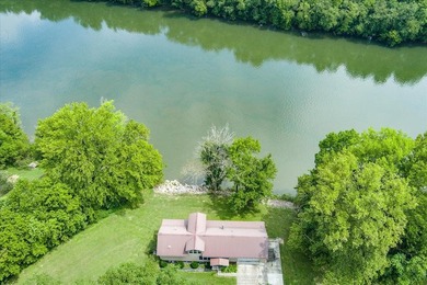 *Down by the lazy river* happily describes this riverside home - photo 39
