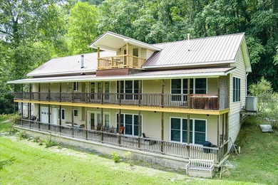 *Down by the lazy river* happily describes this riverside home - photo 41