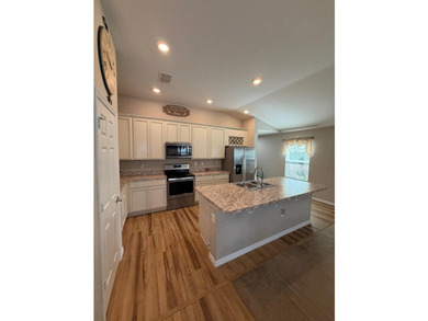 Welcome to this charming 3-bedroom, 2-bathroom home located in - photo 3