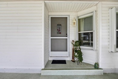 Enjoy lakeside living in this 3-bedroom, 2-bath home located in - photo 3