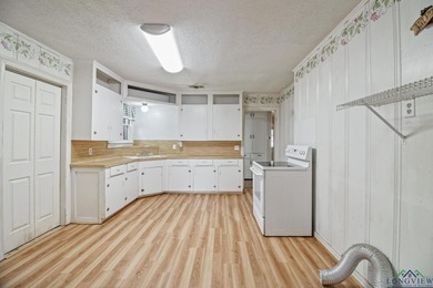 Welcome to 1203 Dogwood, a sweet 3-bedroom, 1-bathroom