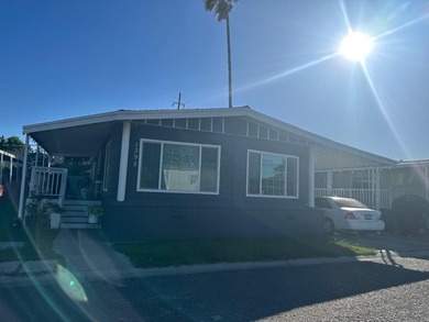 Welcome to the beautiful 1,446 sqft 3 bedroom, 2 bathroom mobile - photo 1