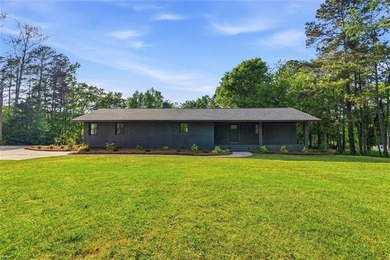 Welcome to this beautifully renovated brick ranch nestled on a - photo 6