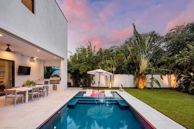Built in 2022 and perfectly positioned in Boca Villas, this - photo 2