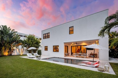 Built in 2022 and perfectly positioned in Boca Villas, this - photo 4