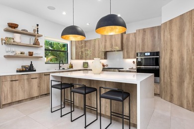 Built in 2022 and perfectly positioned in Boca Villas, this - photo 8