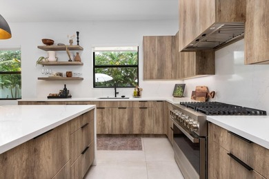 Built in 2022 and perfectly positioned in Boca Villas, this - photo 9