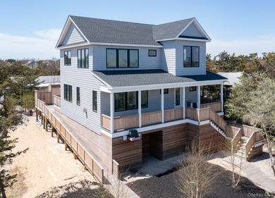 Welcome to 44 Island Walk, a gorgeous, brand-new build located - photo 3