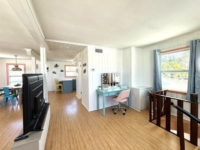 Own one of Treasure Island's rarest beachfront compounds - photo 12