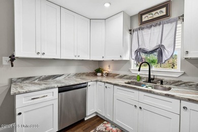 Welcome home to this inviting 4-bedroom, 2-bath home situated on - photo 12