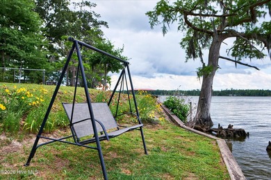 Tucked away in a quiet cove on the beautiful Yeopim River, this - photo 22