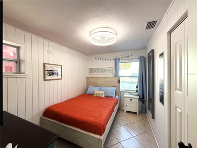 Own one of Treasure Island's rarest beachfront compounds - photo 25