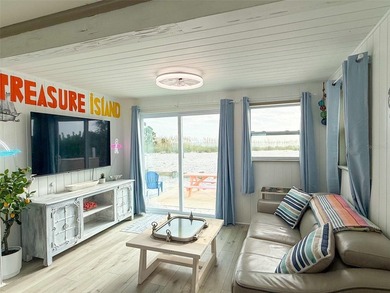 Own one of Treasure Island's rarest beachfront compounds - photo 33