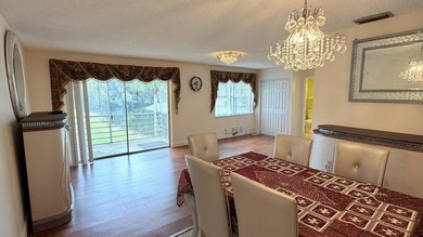 Wellmaintained 2ndfloor corner unit with a bright convertible - photo 2
