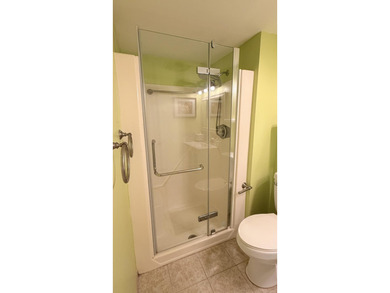 Wellmaintained 2ndfloor corner unit with a bright convertible - photo 5