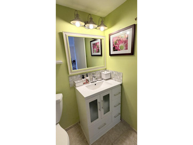 Wellmaintained 2ndfloor corner unit with a bright convertible - photo 6