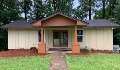 This is the old Corley Realty office. We are completely - Lake Home Sale Pending in Eatonton, Georgia