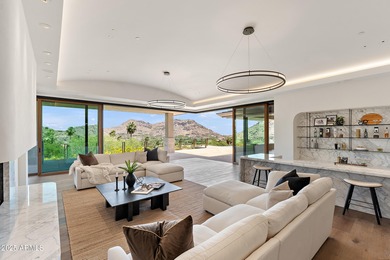 Perched high in the prestigious Tatum Canyon, this modern