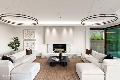 Perched high in the prestigious Tatum Canyon, this modern